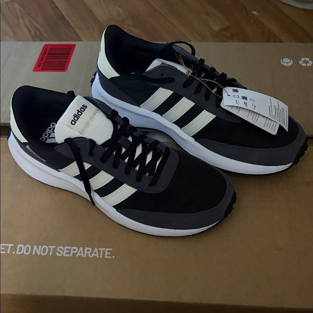 Adidas women’s Black and Cream Sneakers